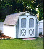 Evergreen wood storage barn